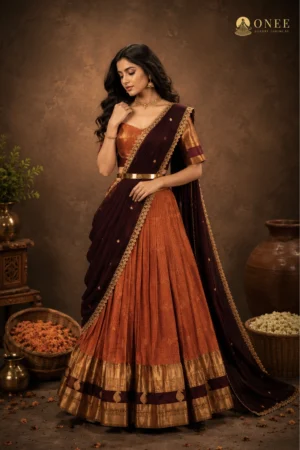 ONEE copper silk bridal lehenga with brown zari dupatta and gold kamarband
