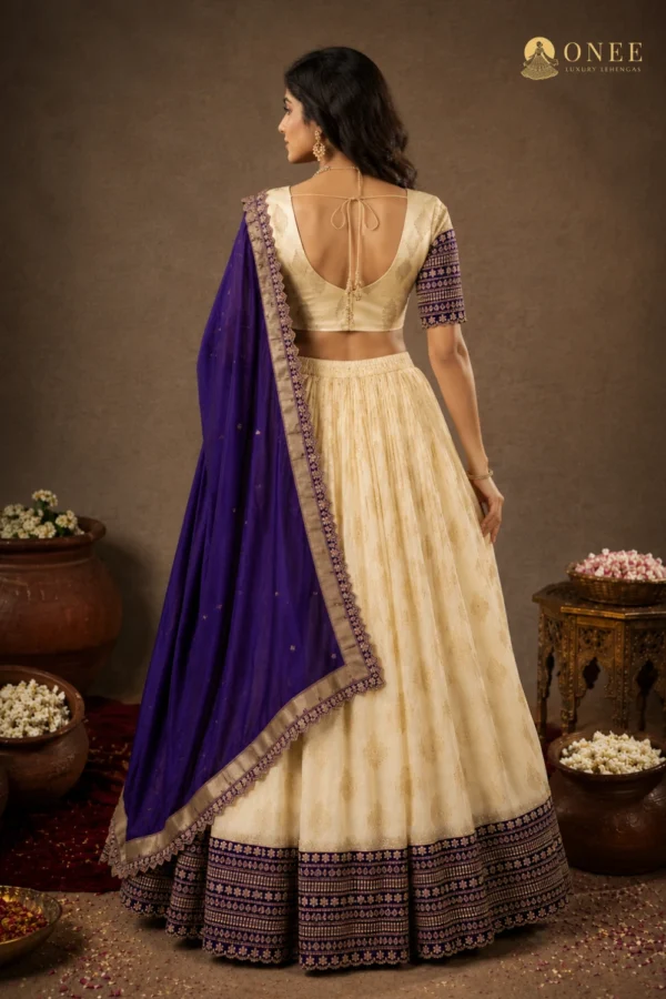 cream & blue 6.1 ONEE ivory bridal lehenga with royal blue dupatta and gold butti work