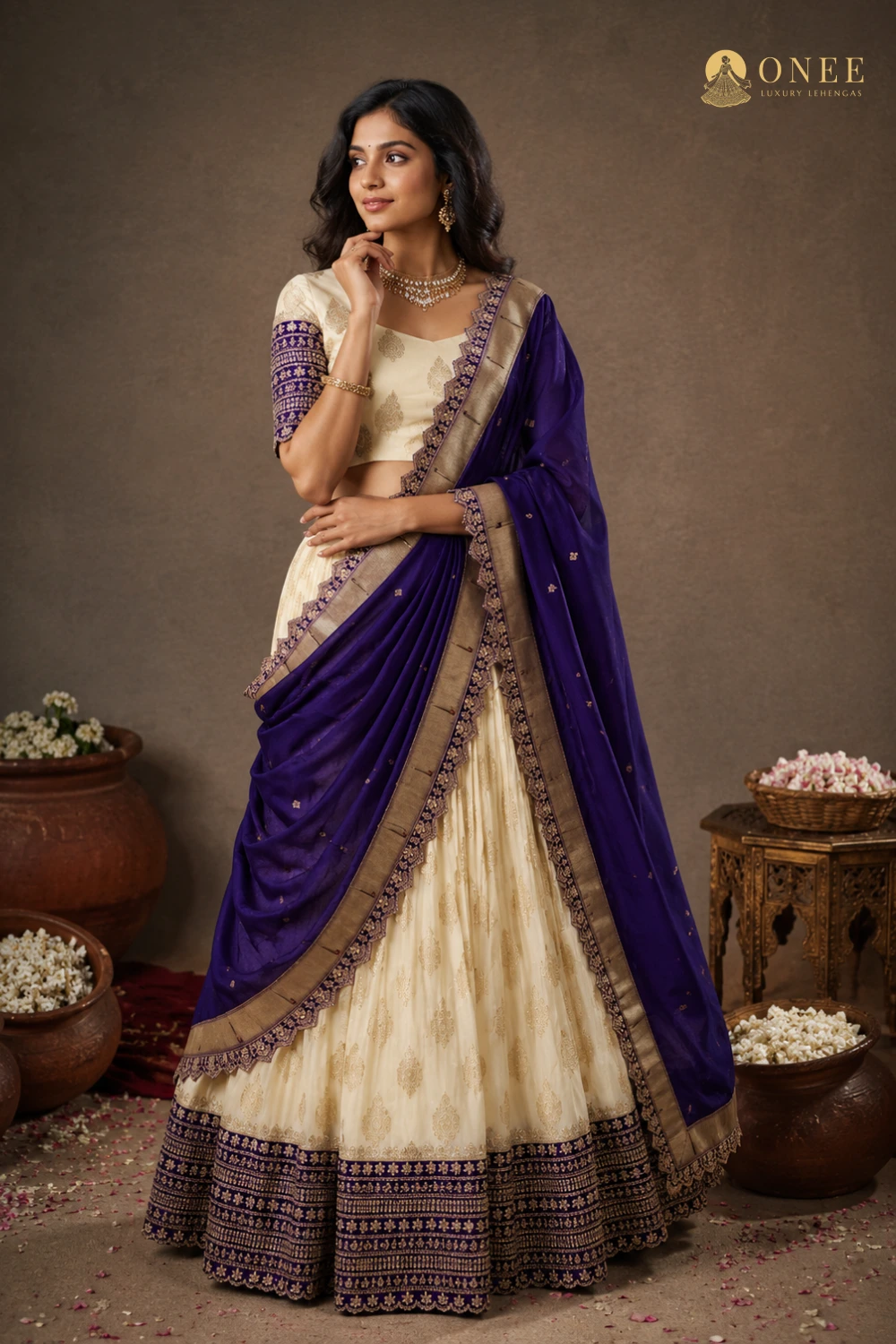 Cream and royal blue lehenga with gold embroidered border – ONEE Luxury Lehengas