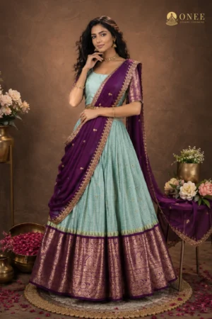 ONEE mint silk bridal lehenga with purple zari dupatta and gold kamarband
